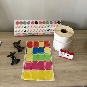 Assorted lot of office supplies - stickers, calendar marks, clips, etc